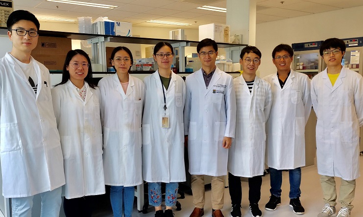 Dr Weiping Wang and members from his lab.