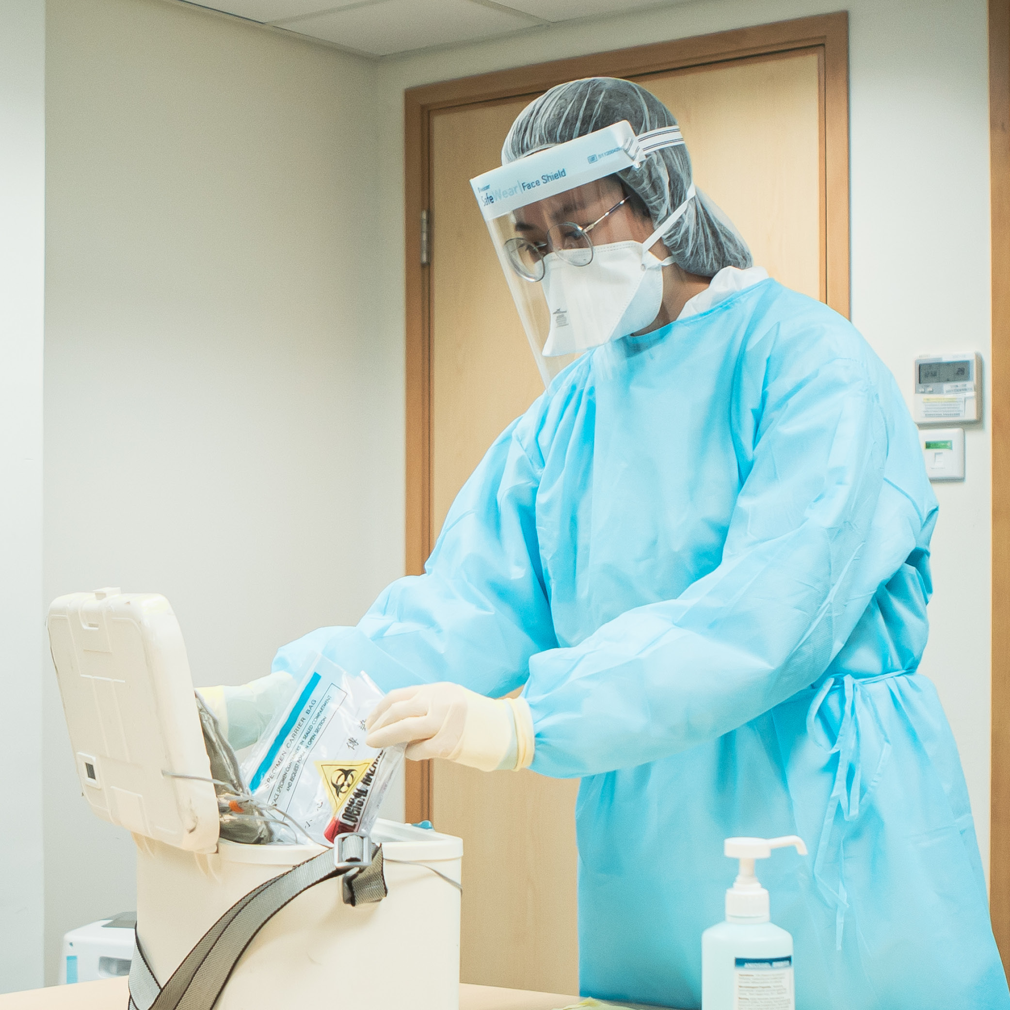 A staff in protective gown.